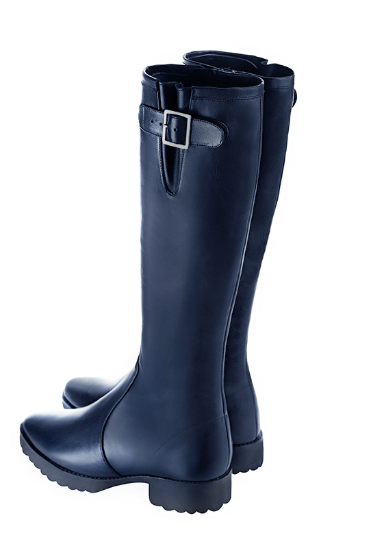 French elegance and refinement for these navy blue knee-high boots with buckles, 
                available in many subtle leather and colour combinations. Record your foot and leg measurements.
We will adjust this beautiful boot with inner zip to your leg measurements in height and width.
The outer buckle allows for width adjustment.
You can customise the boot with your own materials, colours and heels on the "My Favourites" page.
 
                Made to measure. Especially suited to thin or thick calves.
                Matching clutches for parties, ceremonies and weddings.   
                You can customize these knee-high boots to perfectly match your tastes or needs, and have a unique model.  
                Choice of leathers, colours, knots and heels. 
                Wide range of materials and shades carefully chosen.  
                Rich collection of flat, low, mid and high heels.  
                Small and large shoe sizes - Florence KOOIJMAN
